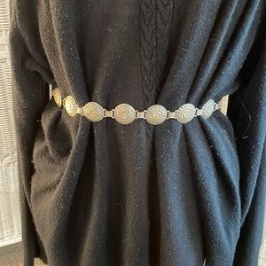 Southwestern silver tone belt.
